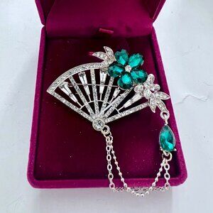 Gold tone Fan brooch with emerald green stone flower and crystals and chains